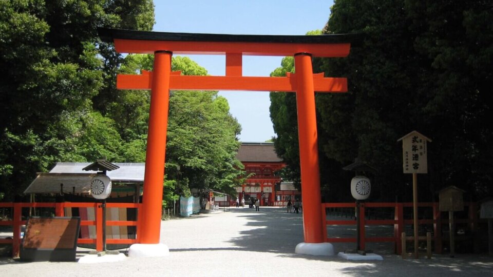 Torii and building and Shimogamo Shrine